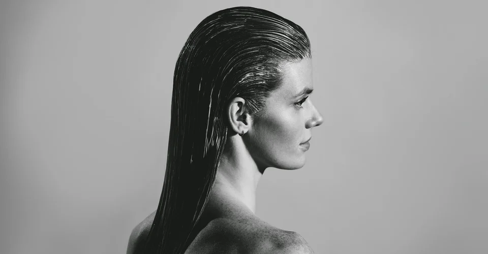 Hair Rituel by Sisley haircare model, black and white