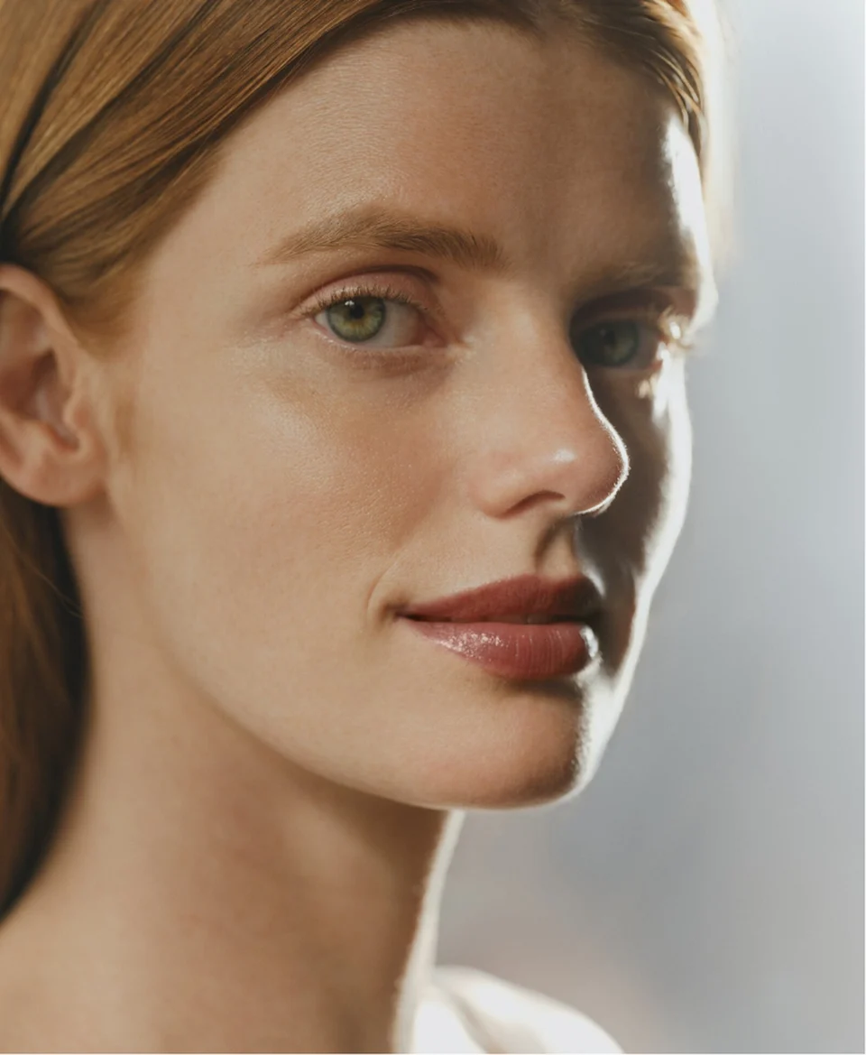 Model wearing Phyto-Lip Balm 