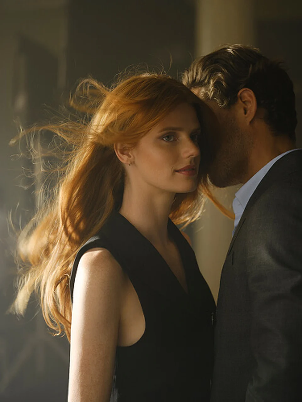 Man breathing in Hair Rituel by Sisley Le Parfum on a woman’s neck