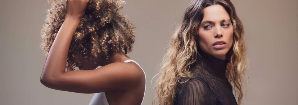 Kinky hair model and curly hair model back-to-back, Intense Nourishment Hair Care Mask